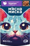 Вологий корм м'ясні шматочки в соусі з індичкою та печінкою для дорослих котів М'ясна Миска 100 г